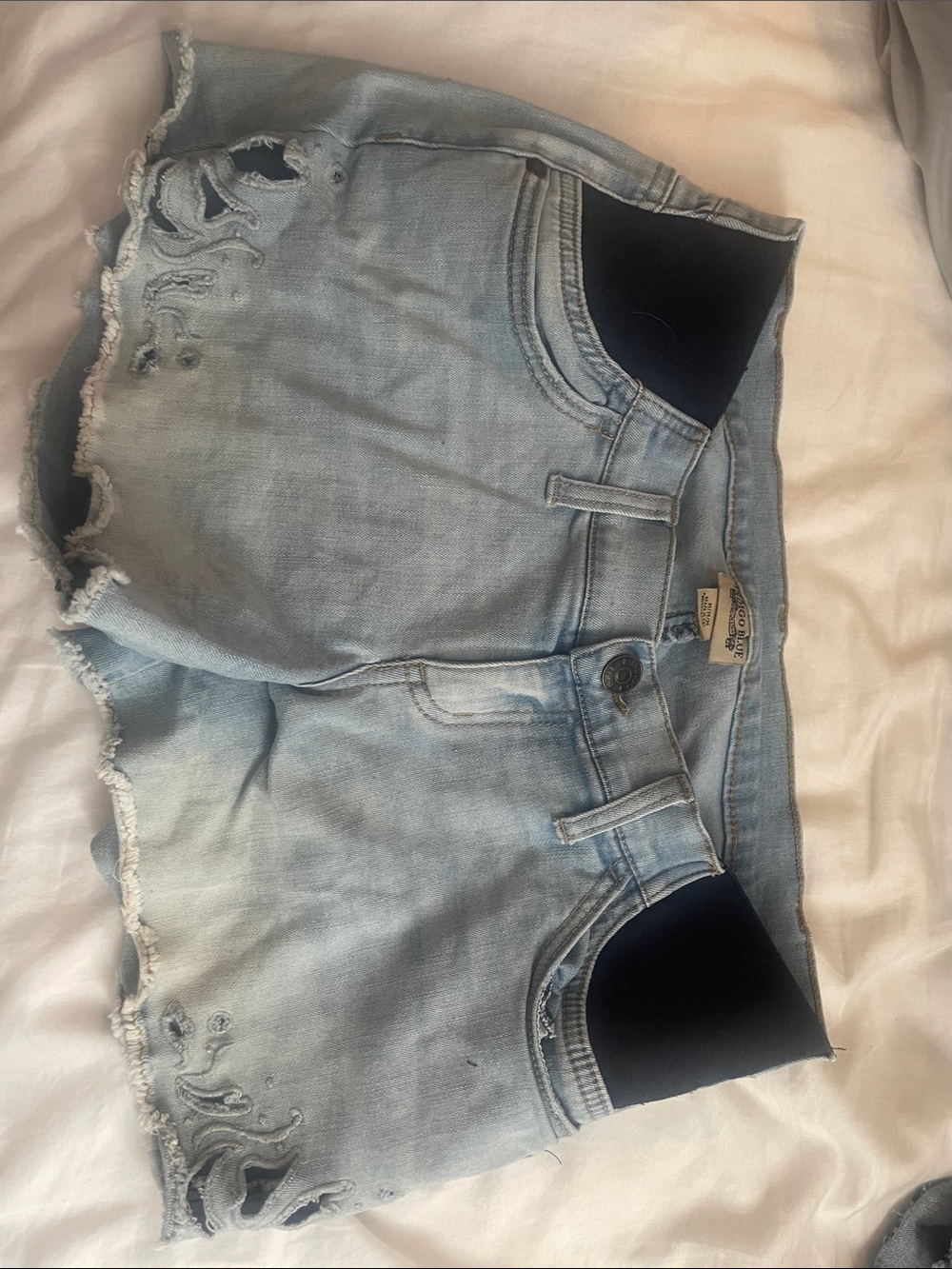 Indigo Blue Light Wash Distressed Jean Shorts